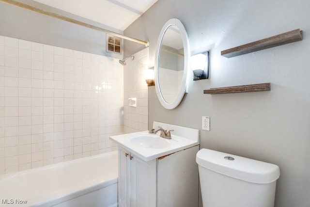 bathroom with bathtub / shower combination, visible vents, vanity, and toilet