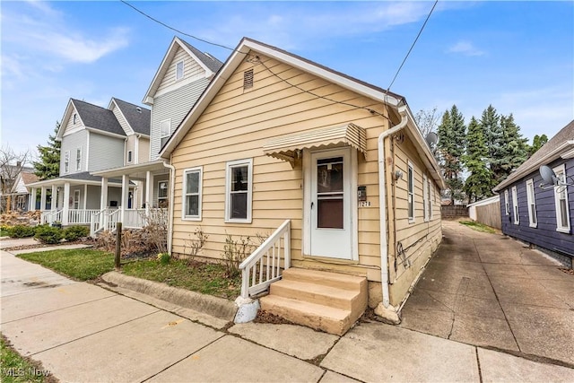 view of front of house featuring covered porch and entry steps