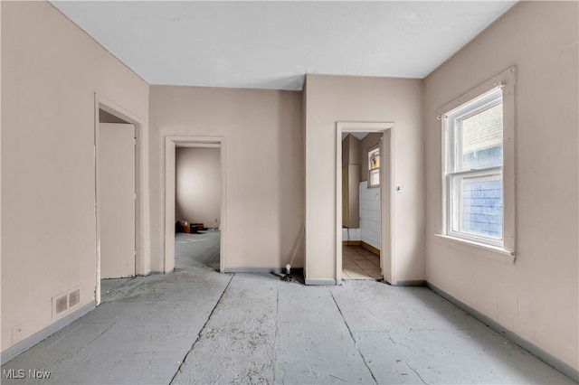 spare room featuring visible vents