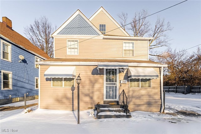 view of snow covered property