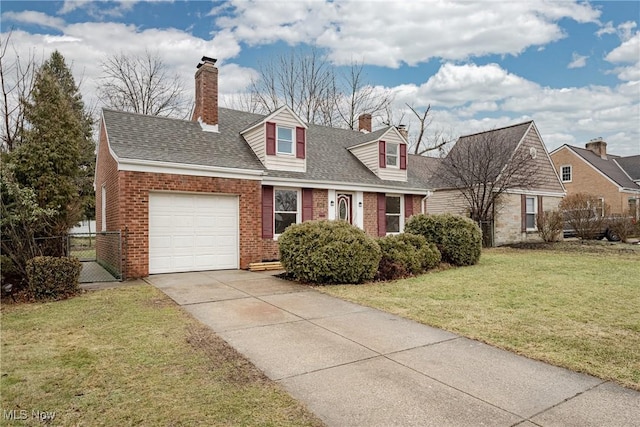 new england style home featuring brick siding, fence, a garage, driveway, and a front lawn