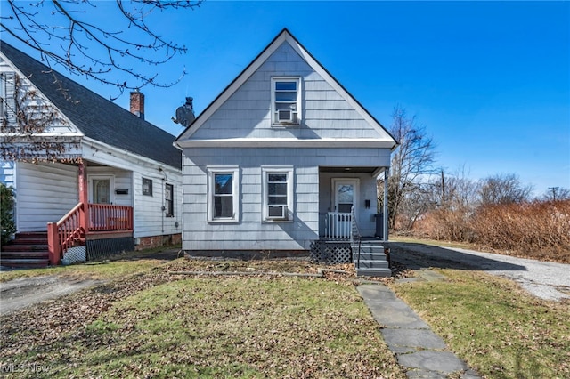 1314 Cove Ave, Lakewood, OH 44107 - view of front of property featuring a front lawn and cooling unit