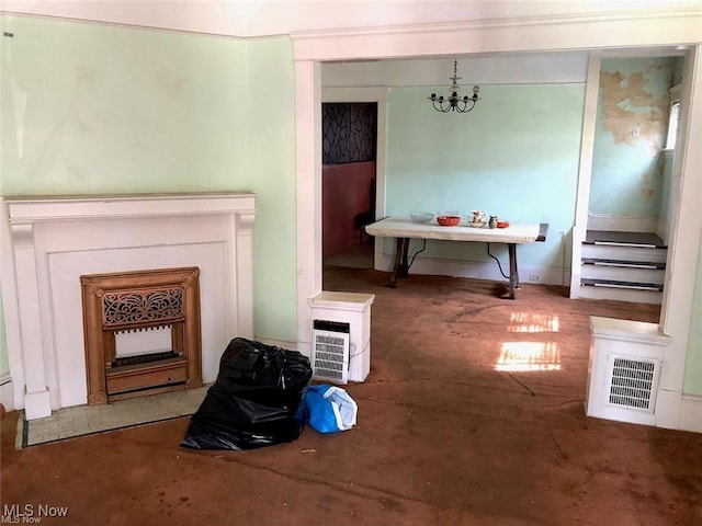 dining room featuring an inviting chandelier and visible vents