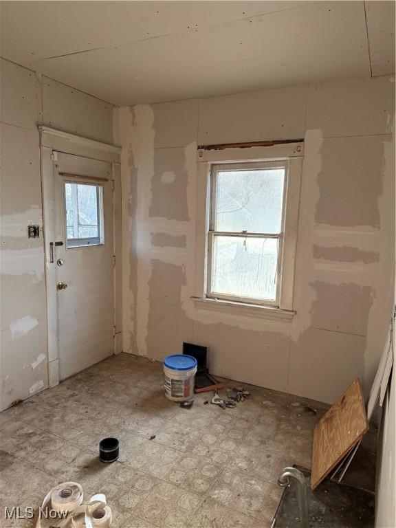 misc room featuring tile patterned floors