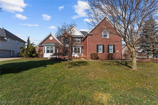 traditional-style home with brick siding and a front lawn