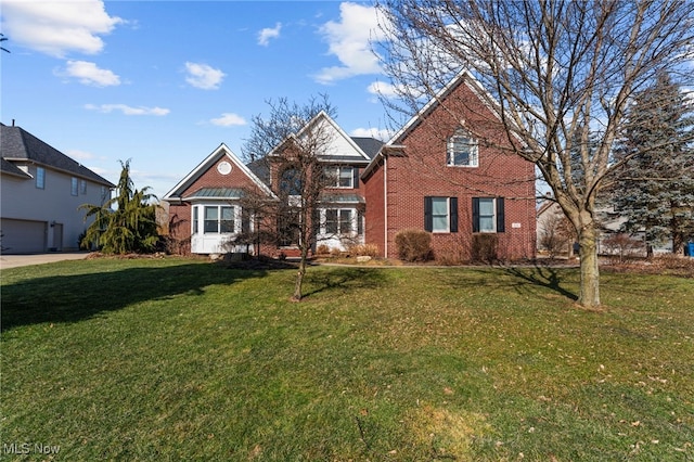 616 Coventry Pl, Amherst, OH 44001 - traditional-style home with brick siding and a front lawn