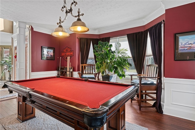 616 Coventry Pl, Amherst, OH 44001 - recreation room with ornamental molding, a textured ceiling, pool table, dark wood-style floors, and decorative columns