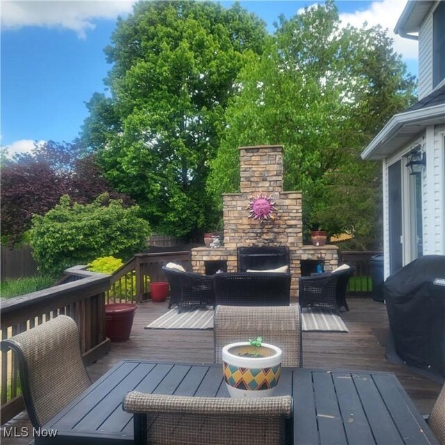 616 Coventry Pl, Amherst, OH 44001 - wooden terrace featuring an outdoor living space with a fireplace