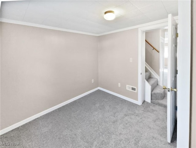 interior space with visible vents, stairway, and baseboards