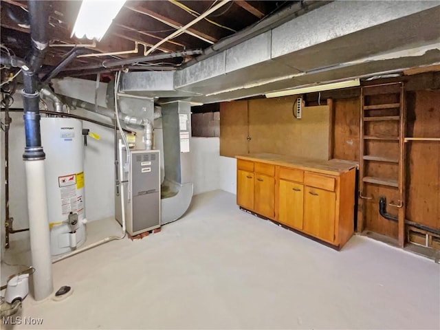 unfinished below grade area with gas water heater and heating unit