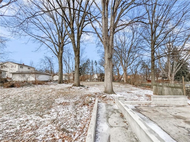 view of yard covered in snow