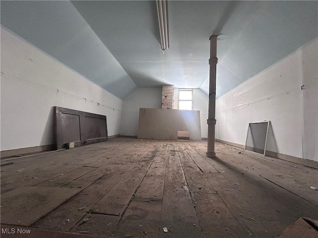 bonus room with vaulted ceiling