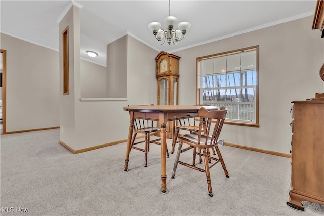 dining space featuring baseboards, ornamental molding, and light colored carpet