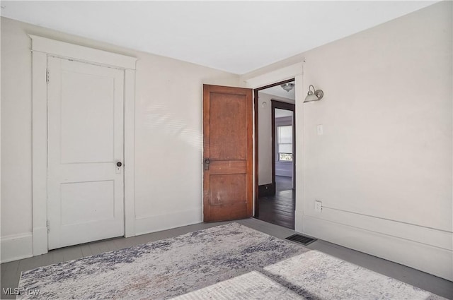 unfurnished bedroom with visible vents