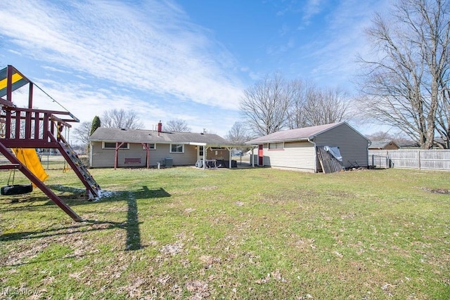 10684 Barcus Ave NE, Alliance, OH 44601 - view of yard with a playground and fence