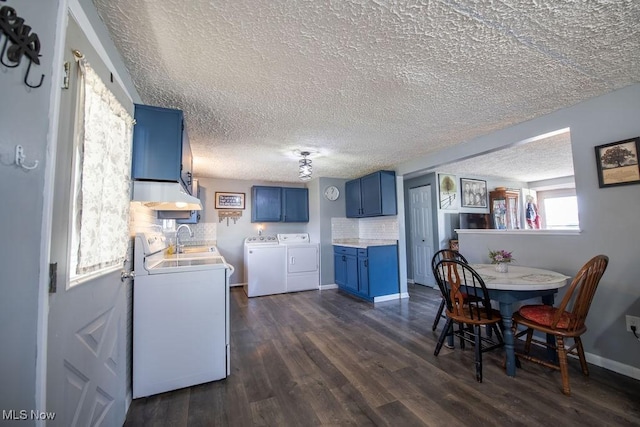 10684 Barcus Ave NE, Alliance, OH 44601 - kitchen with tasteful backsplash, dark wood-type flooring, independent washer and dryer, blue cabinets, and a sink
