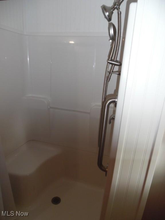 full bathroom with walk in shower