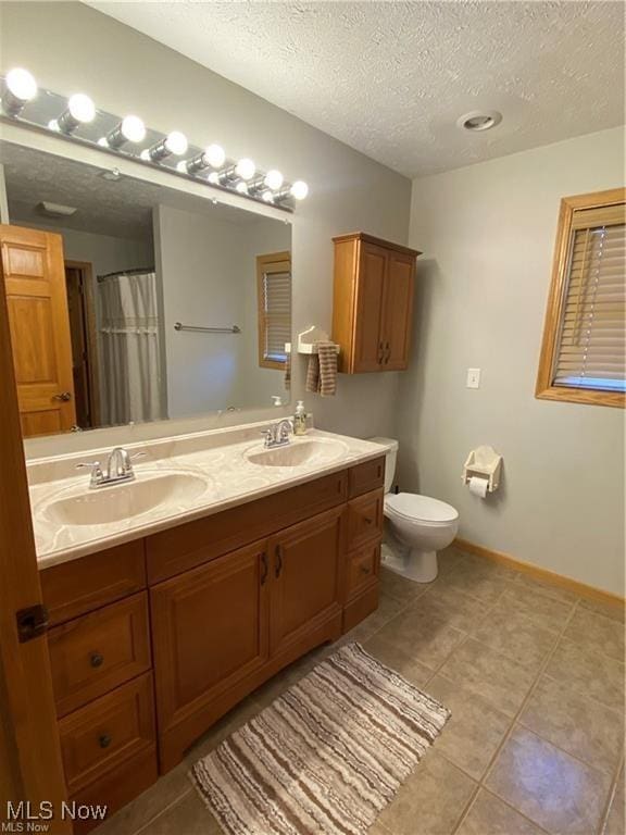5 Grandview Dr, Mineral Wells, WV 26150 - full bath with tile patterned flooring, a sink, toilet, and double vanity