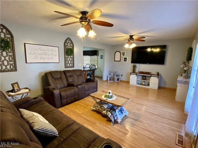 5 Grandview Dr, Mineral Wells, WV 26150 - living area with baseboards, visible vents, and wood finished floors