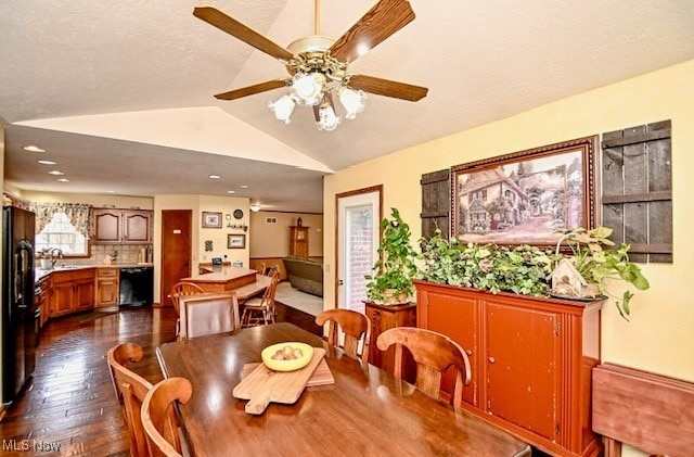 10400 Stoneacre St NW, Canal Fulton, OH 44614 - dining area with lofted ceiling, dark wood-style flooring, and ceiling fan