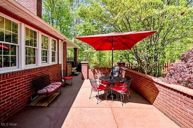 10400 Stoneacre St NW, Canal Fulton, OH 44614 - view of patio / terrace featuring outdoor dining space