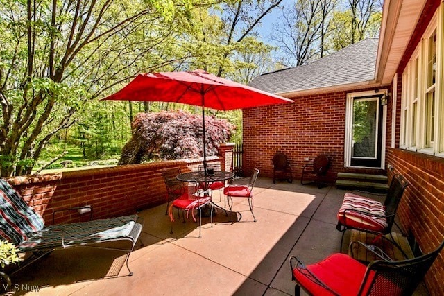 10400 Stoneacre St NW, Canal Fulton, OH 44614 - view of patio featuring outdoor dining area