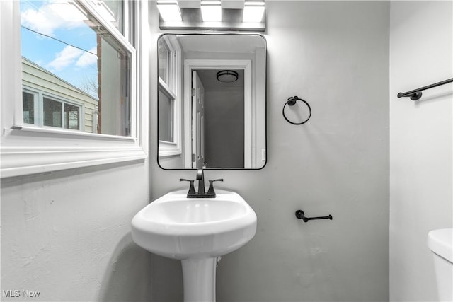 bathroom featuring toilet