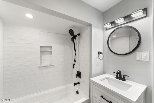 bathroom featuring vanity and shower / bathtub combination