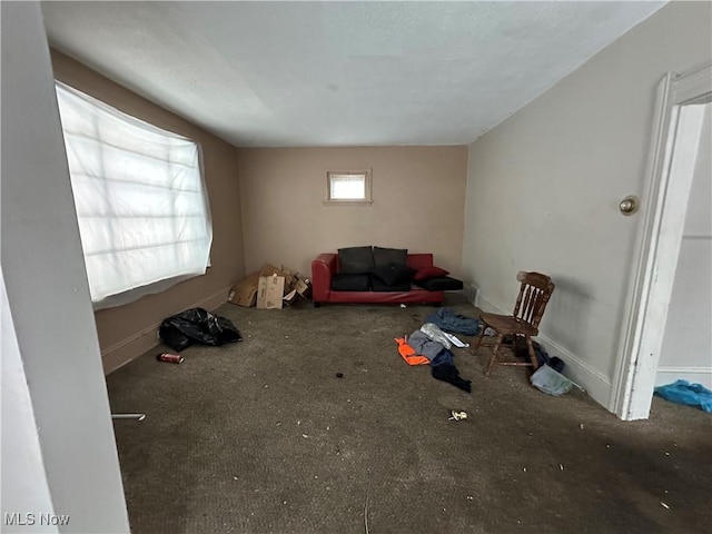 interior space featuring baseboards