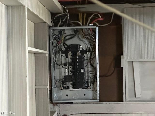 utility room featuring electric panel