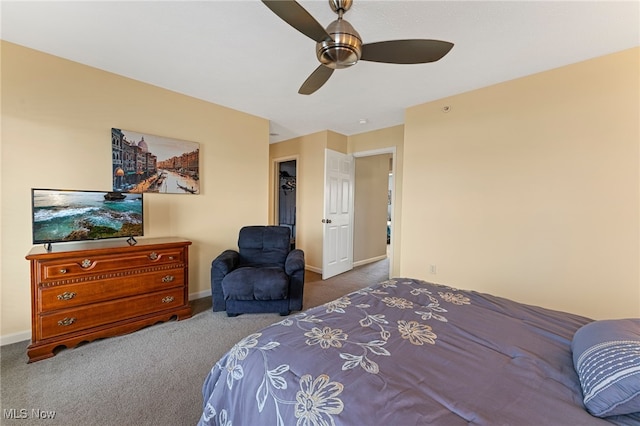 bedroom with carpet floors, baseboards, and a ceiling fan