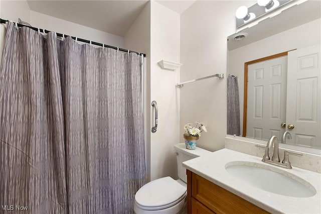 full bathroom with a shower with curtain, visible vents, vanity, and toilet