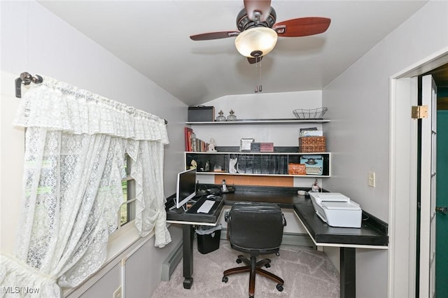 carpeted home office featuring a ceiling fan and lofted ceiling