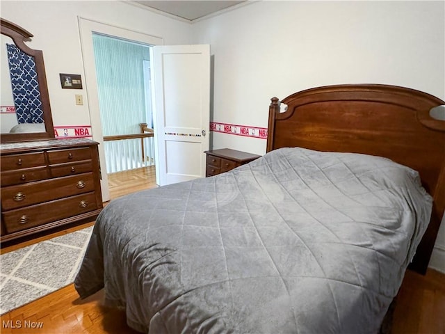 4109 Grand Central Ave, Vienna, WV 26105 - bedroom featuring ornamental molding and wood finished floors