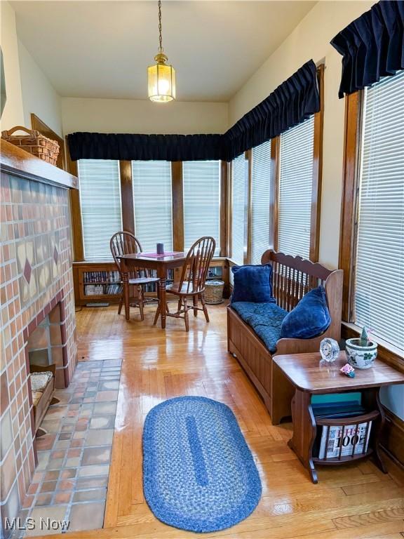 4109 Grand Central Ave, Vienna, WV 26105 - living room featuring a fireplace and light wood-style flooring