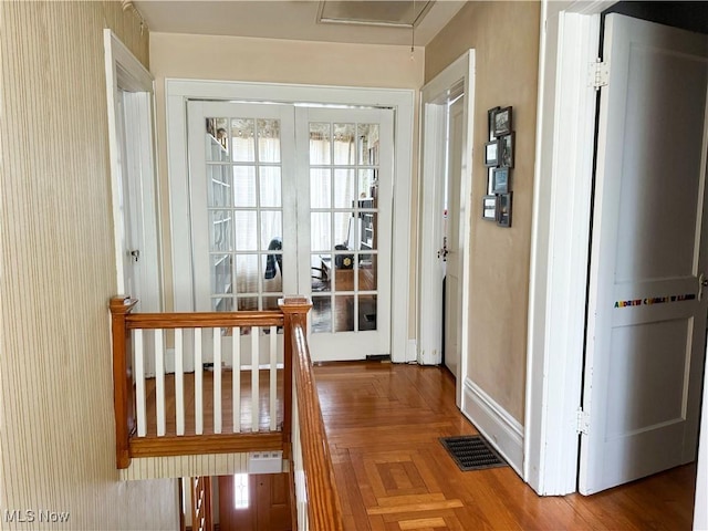 entryway featuring french doors, visible vents, and baseboards