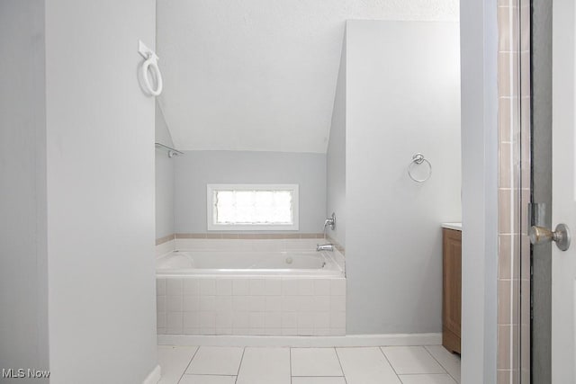 11915 Franklin Blvd, Lakewood, OH 44107 - full bath with tile patterned floors, an enclosed shower, vaulted ceiling, vanity, and a bath