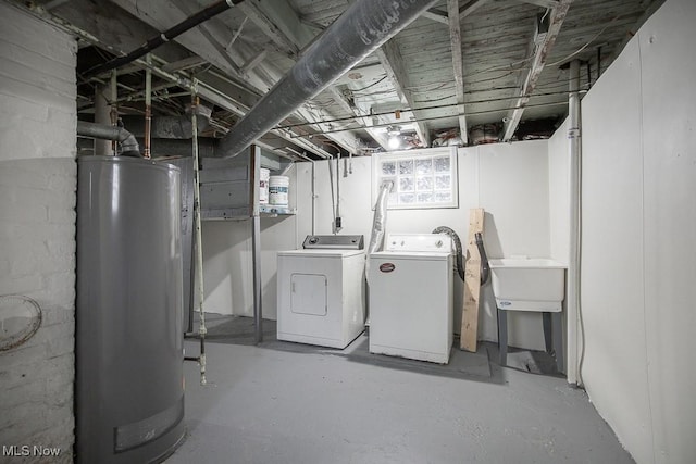 11915 Franklin Blvd, Lakewood, OH 44107 - below grade area featuring water heater and washer and dryer