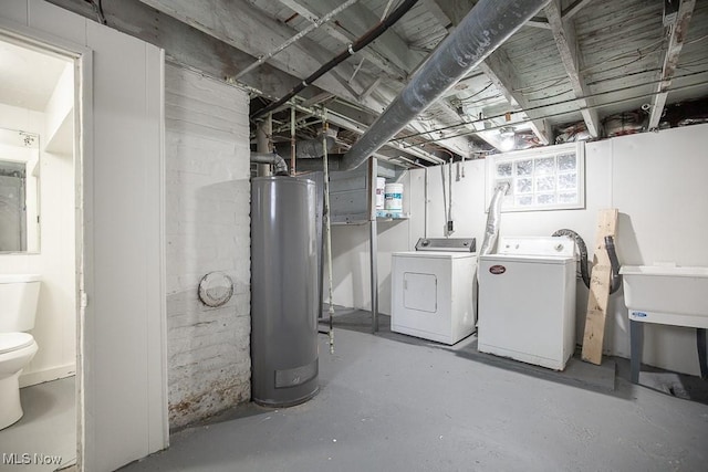 11915 Franklin Blvd, Lakewood, OH 44107 - basement featuring gas water heater and washing machine and dryer