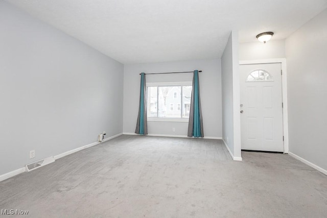 11915 Franklin Blvd, Lakewood, OH 44107 - entryway featuring carpet flooring, visible vents, and baseboards