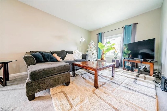 11915 Franklin Blvd, Lakewood, OH 44107 - carpeted living room with lofted ceiling and baseboards