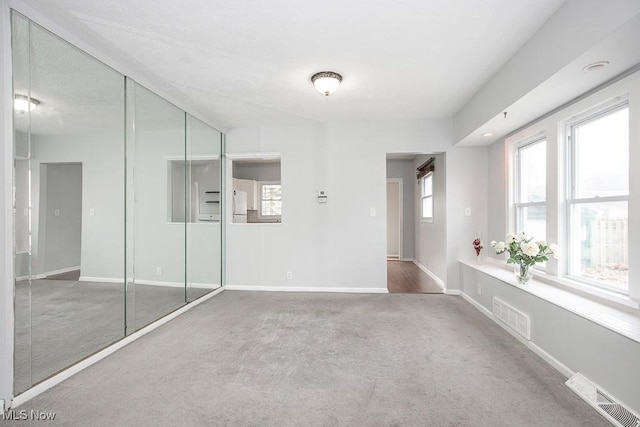 11915 Franklin Blvd, Lakewood, OH 44107 - interior space with baseboards, visible vents, and a wealth of natural light