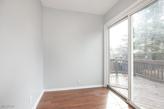 11915 Franklin Blvd, Lakewood, OH 44107 - unfurnished room with plenty of natural light, baseboards, and hardwood / wood-style flooring
