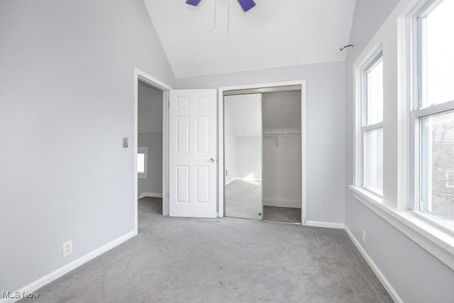 11915 Franklin Blvd, Lakewood, OH 44107 - unfurnished bedroom featuring vaulted ceiling, carpet floors, a closet, and baseboards