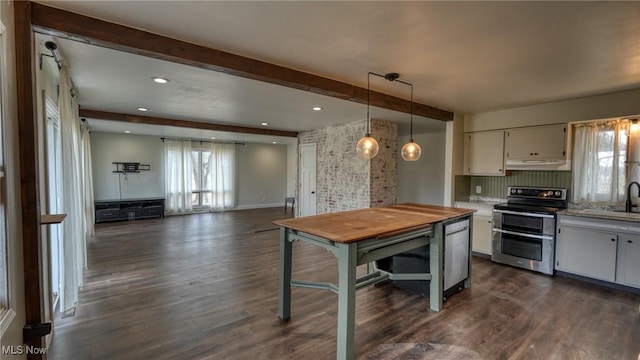 kitchen with range with two ovens, dark wood-style flooring, white cabinets, beamed ceiling, and under cabinet range hood