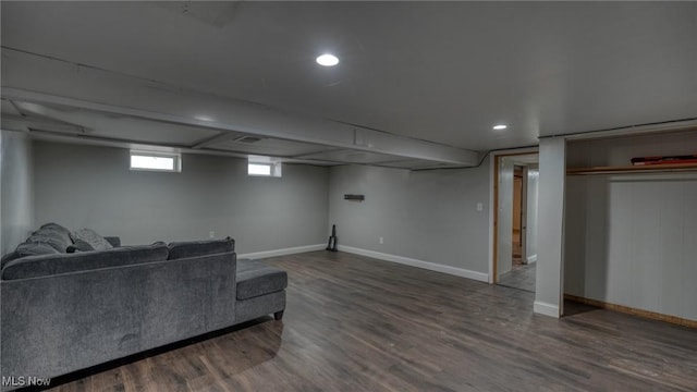 living area with recessed lighting, wood finished floors, and baseboards