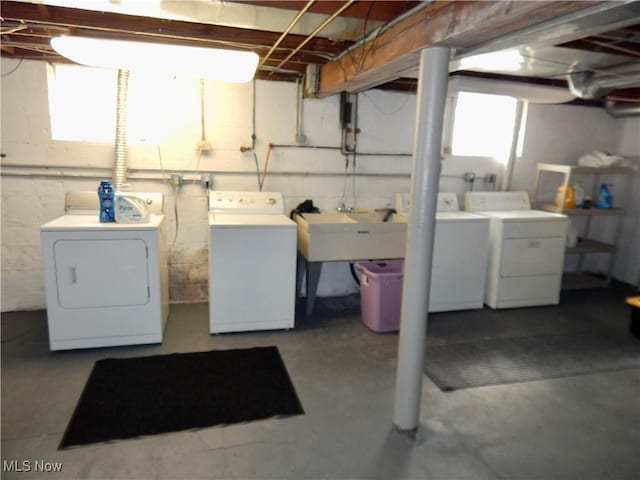 laundry room featuring laundry area and washing machine and dryer