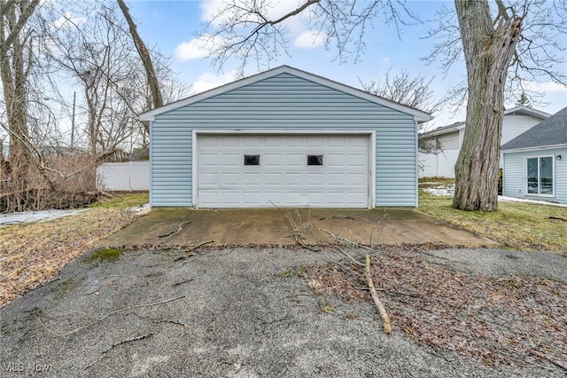 detached garage with fence