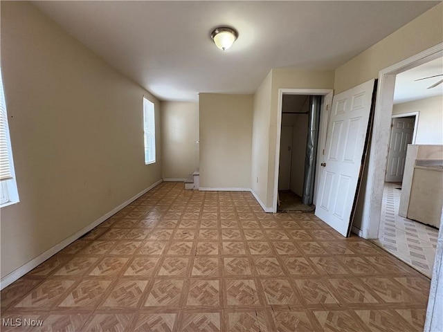 interior space with baseboards