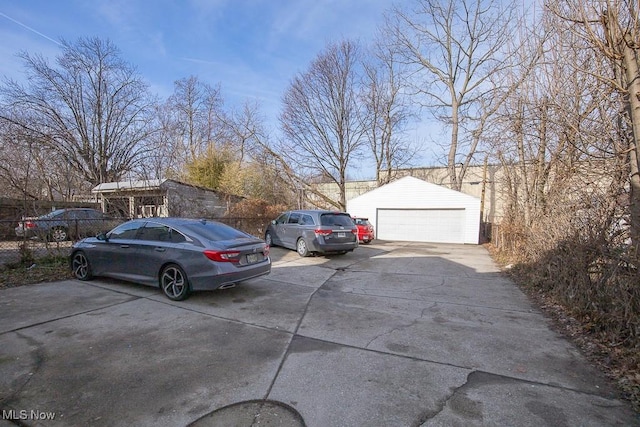 view of parking with a garage